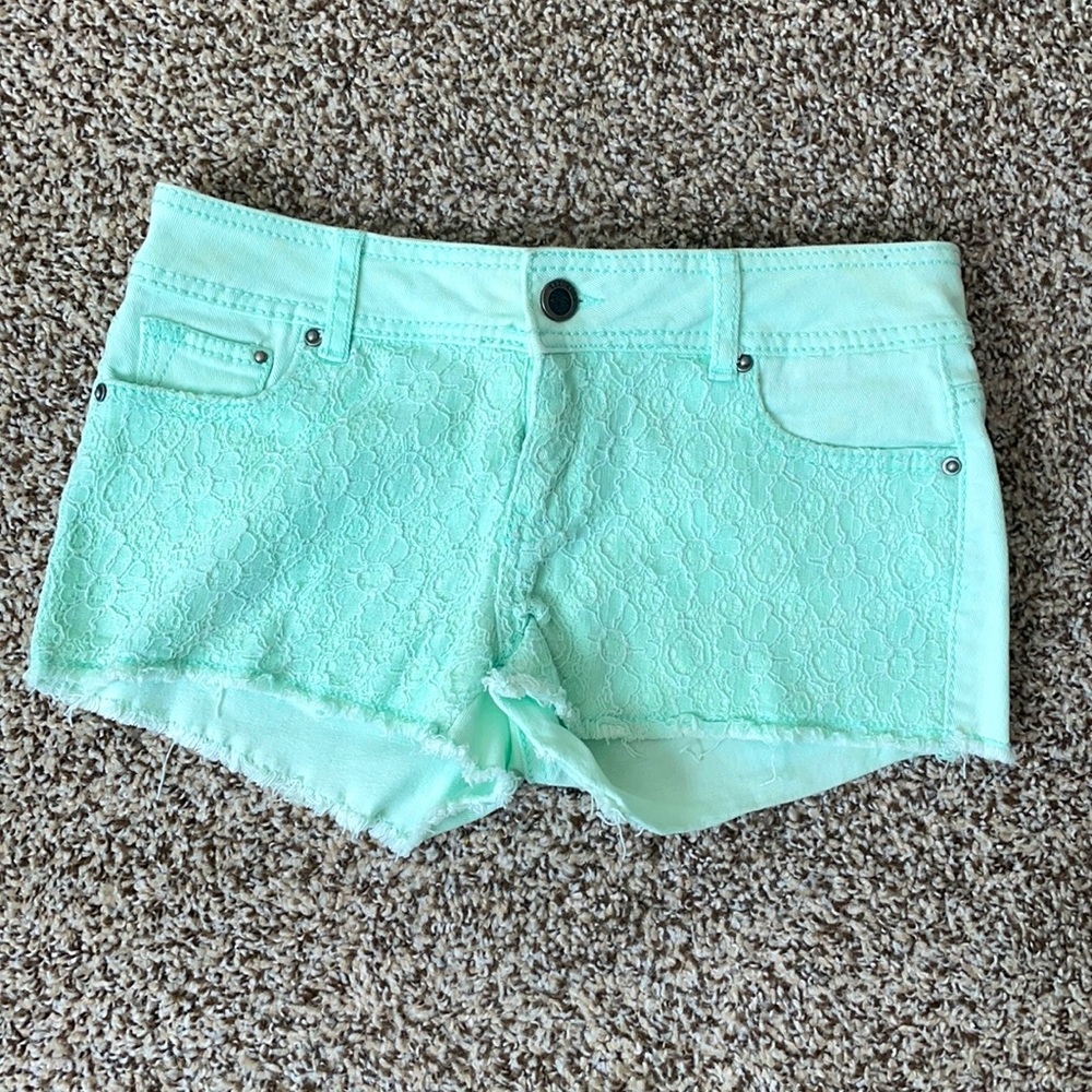 Teal jean shorts